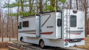 An RV parked outdoors at an RV campground.