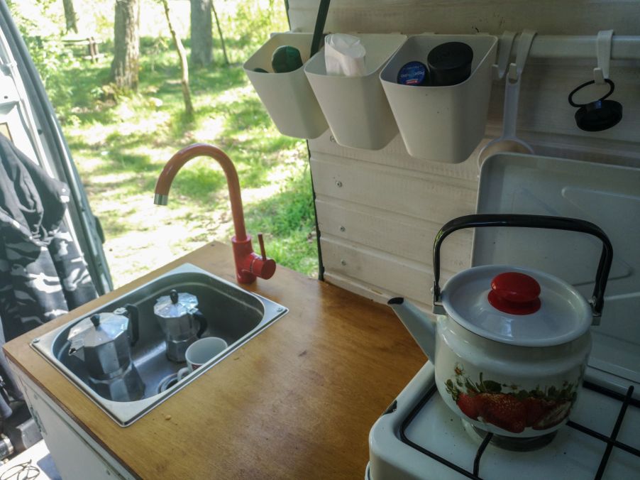 An RV camper van kitchen unit with a USSR style kettle in Oslonino, Poland