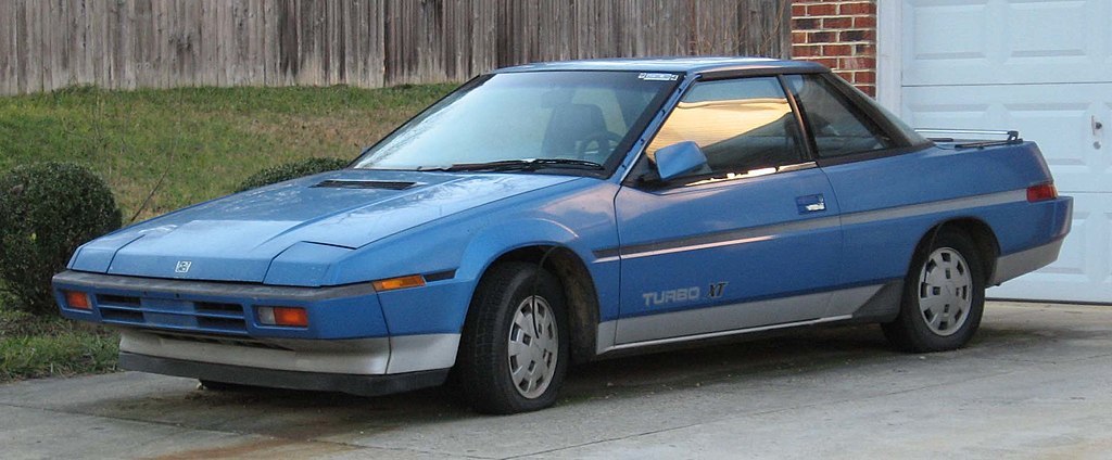 Subaru XT6 in blue parked in a driveway