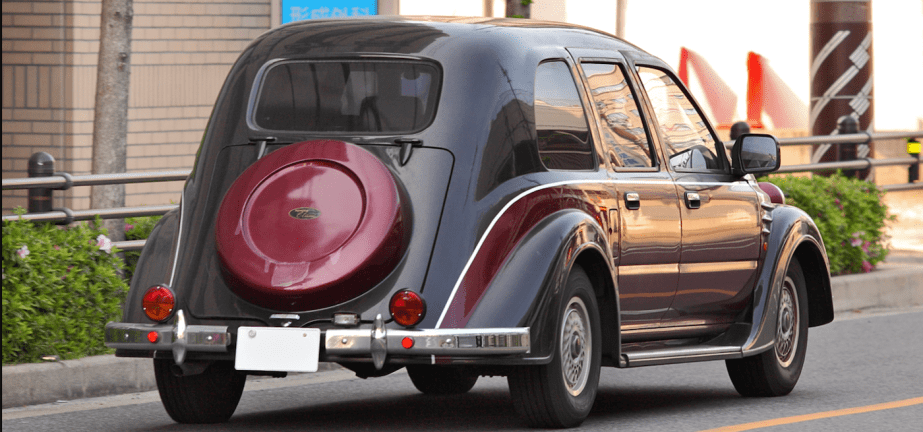 Red and black Toyota Classic rear end