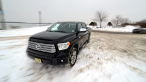 A used Toyota Tundra shows off in some winter weather as a full-size truck.