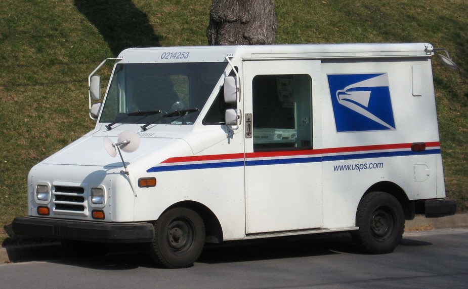 A Grumman LLV mail truck delivers some mail. It may have an Iron Duke engine.