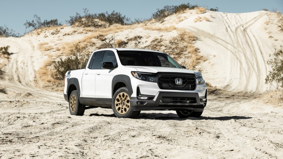 White Honda Ridgeline, the only compact truck U.S. News loves.