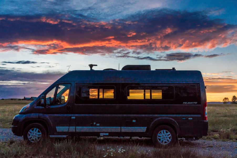 A Winnebago Class C Travato motorhome parked in Hasting Mesa in Ridgway, Colorado, at sunset