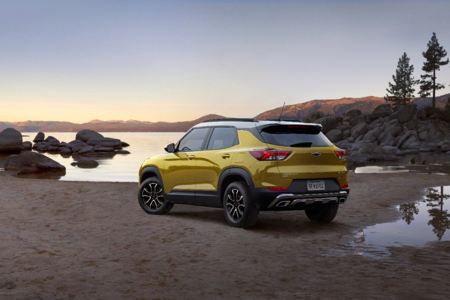 Front angle view of yellow 2023 Chevy Trailblazer, highlighting its release date and price