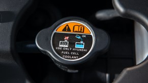 A close-up picture of a Hyundai radiator coolant cap.