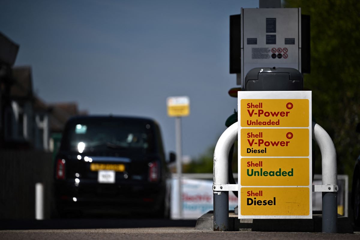 A sign at a Shell station advertising the different types of fuel. Fuel rewards programs can help you save money.