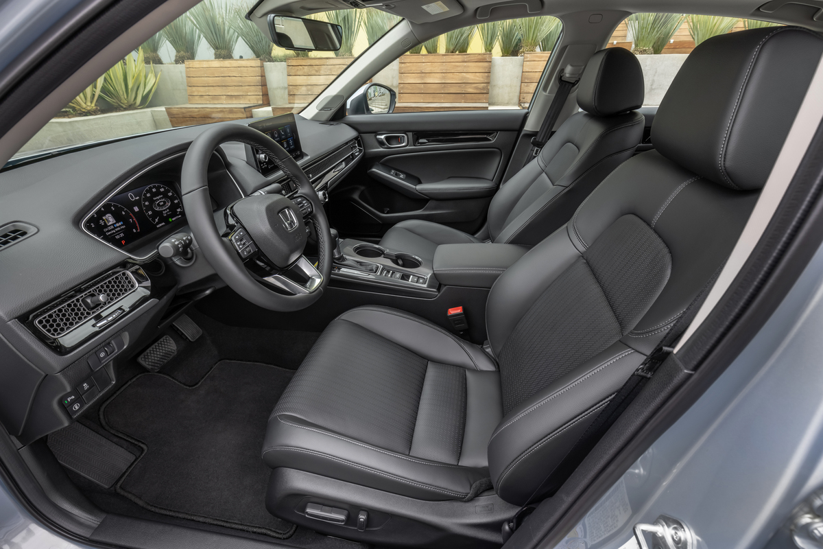 Interior of a new Honda Civic sedan. Many drivers choose to install their fire extinguisher in front of the driver's or front passenger seat