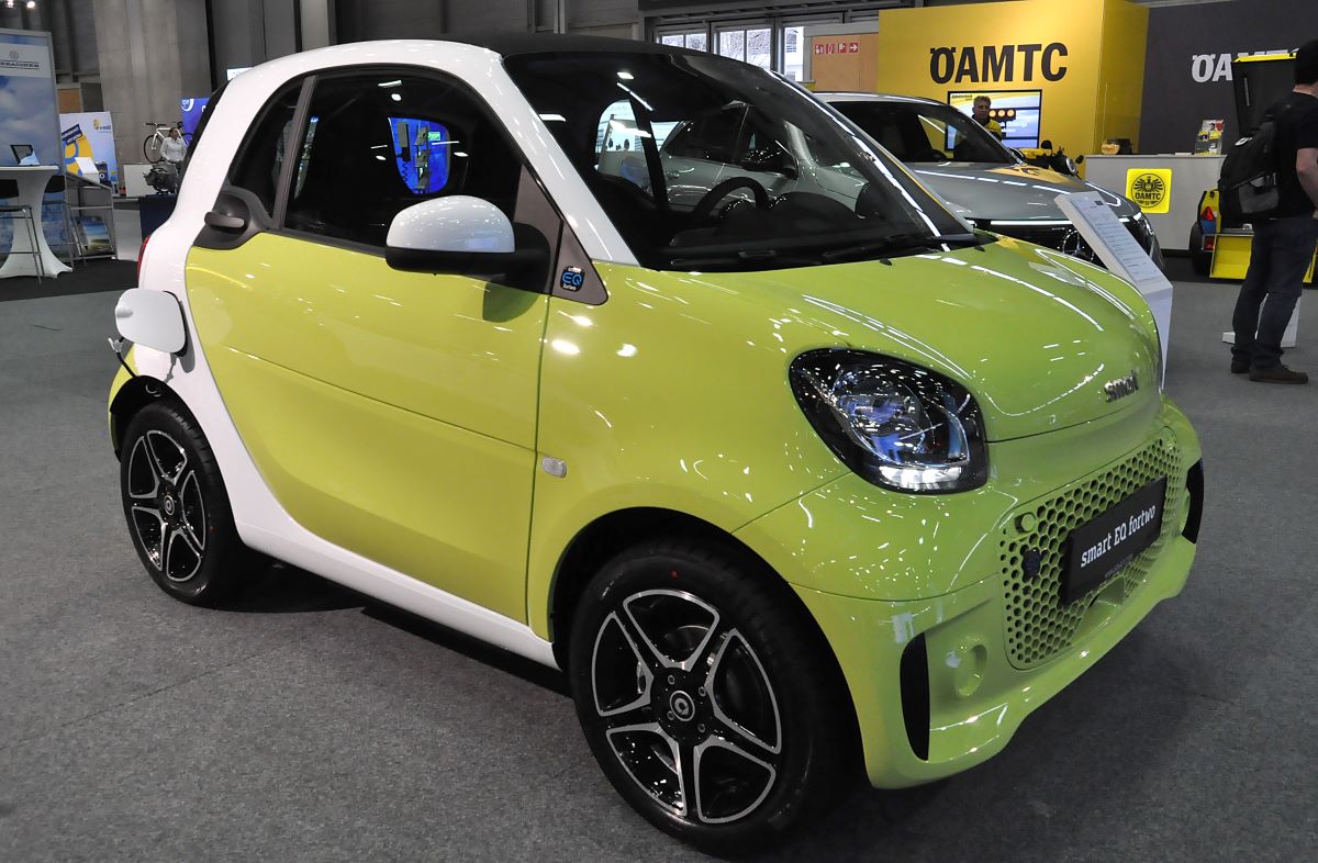 Neon green Smart EQ For Two, one of the most affordable used electric cars