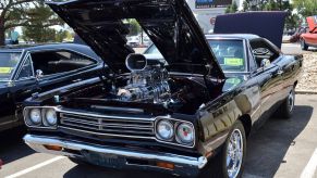 A 1969 Plymouth Road Runner with a V8 engine on display at Hot August Nights Custom Car Show in Reno, Nevada