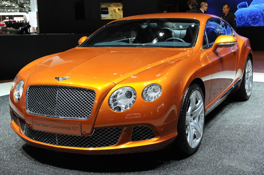 An orange 2012 Bentley Continental GT at the 2011 Geneva Motor Show