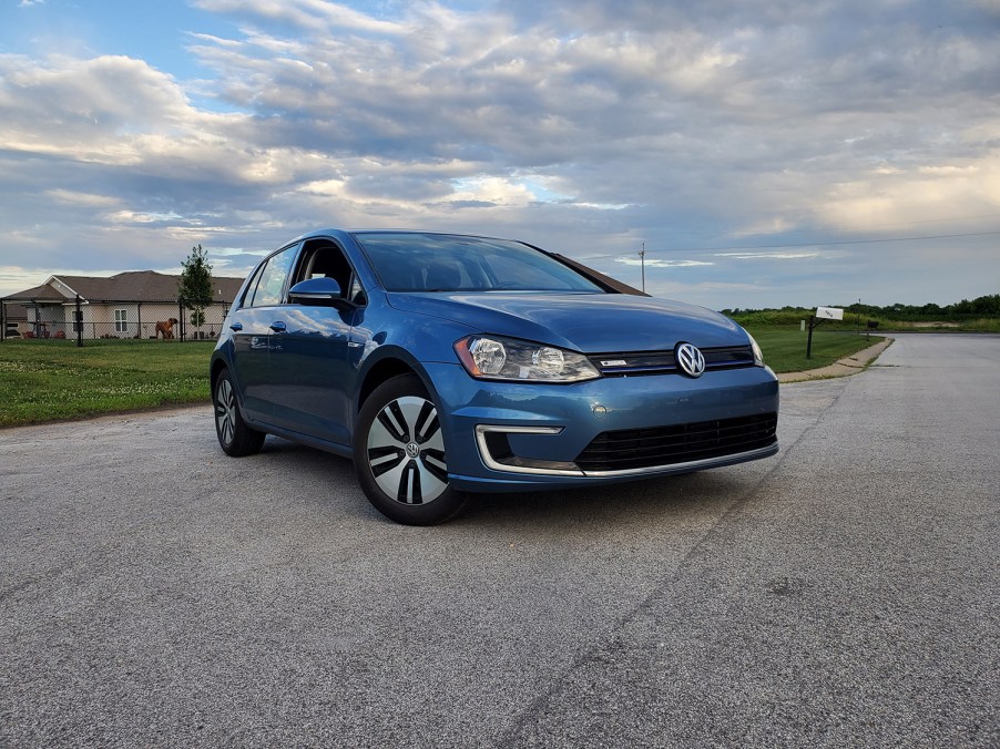 Blue 2016 Volkswagen e-golf electric vehicle EV parked in front of evening sun in Missouri