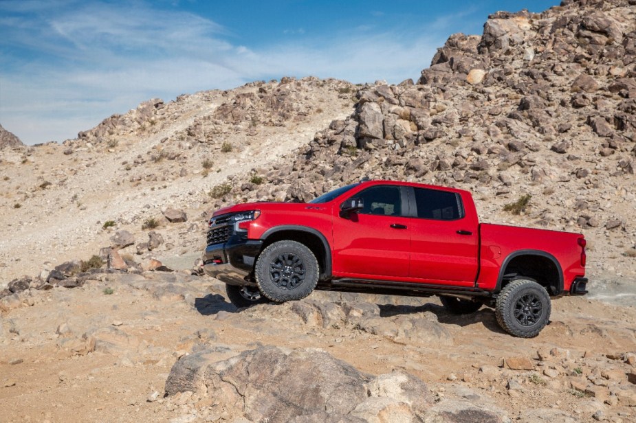 2022 Chevy Silverado ZR2 on dirt. Which of the Chevy trucks gets better fuel economy?