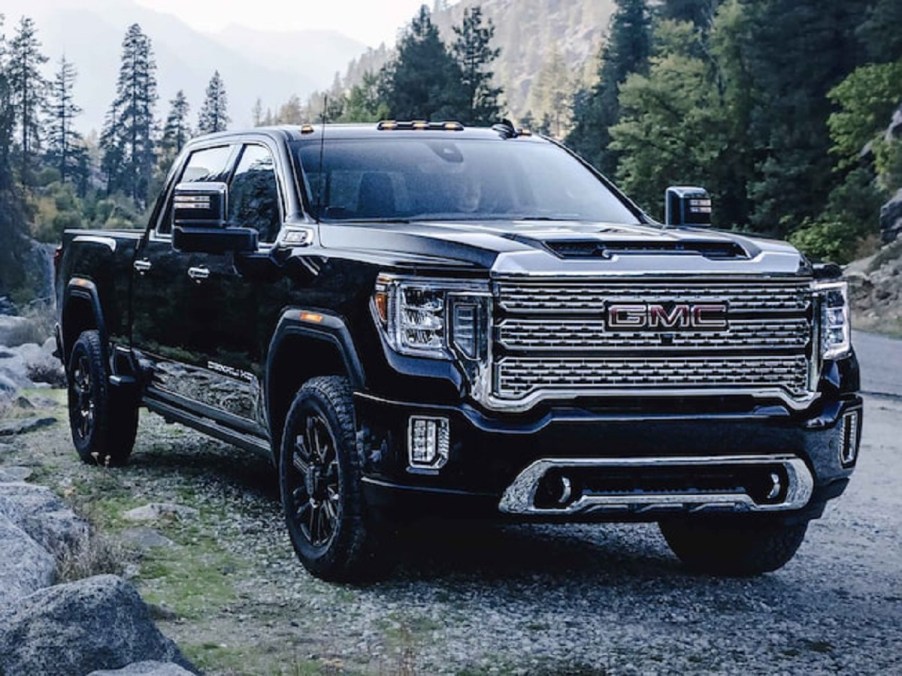 A black 2022 GMC Sierra 2500 in the woods.