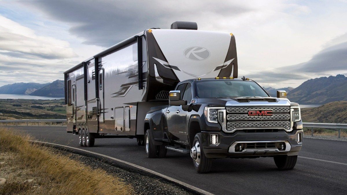 2022 GMC Sierra 3500 HD Dually pulling a big travel trailer