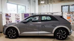 A grey Hyundai Ioniq 5 parked indoors.