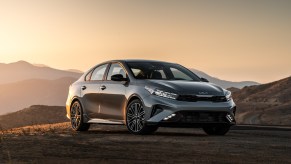 A silver 2022 Kia Forte parked outdoors.