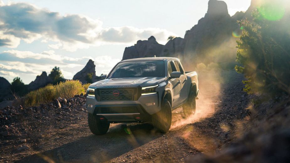 A 2022 Nissan Frontier shows off its off-road prowess as a mid-size truck