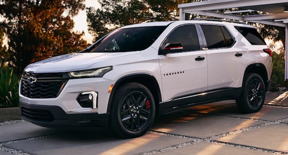 A white 2023 Chevrolet Traverse is parked. 