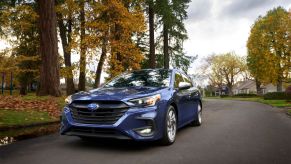 Blue 2023 Subaru Legacy midsize sedan. There are five Legacy trim levels this year