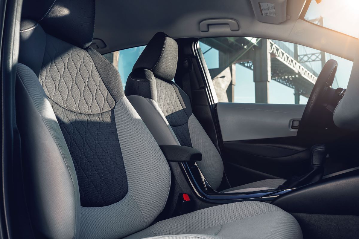 Black and grey interior of the 2023 Toyota Corolla Hybrid sedan