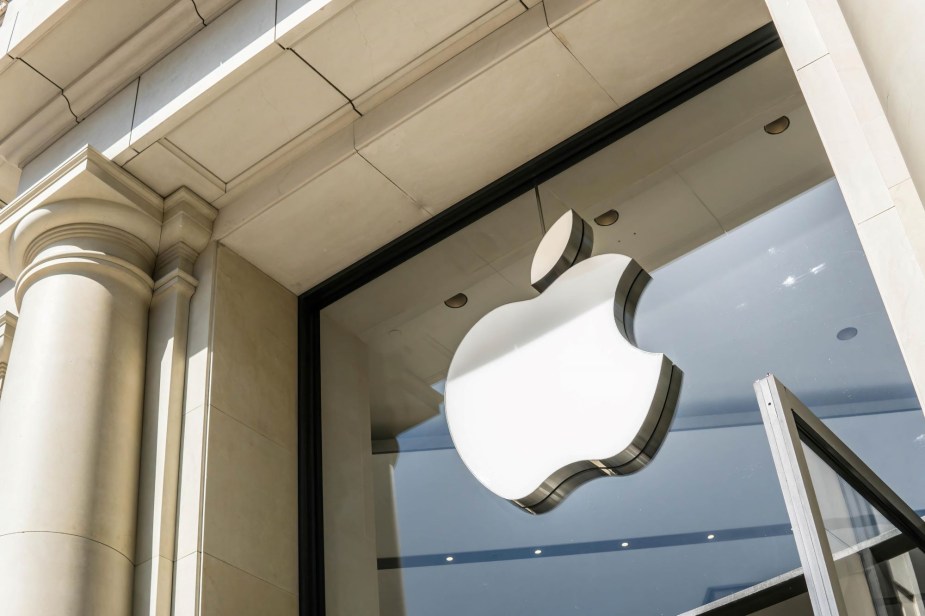 Apple logo on a window on a building. 