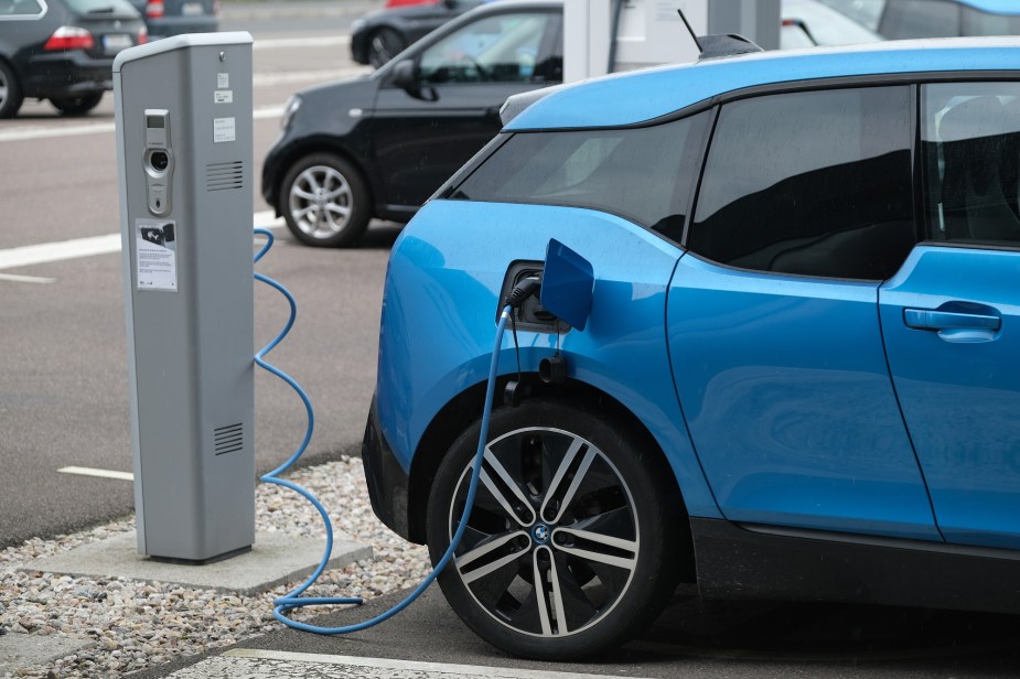 The BMW i3, shown here charging, is the EV that loses value unlike any other electric car.