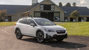 The best used Subaru Crosstrek SUV parked in front of a building