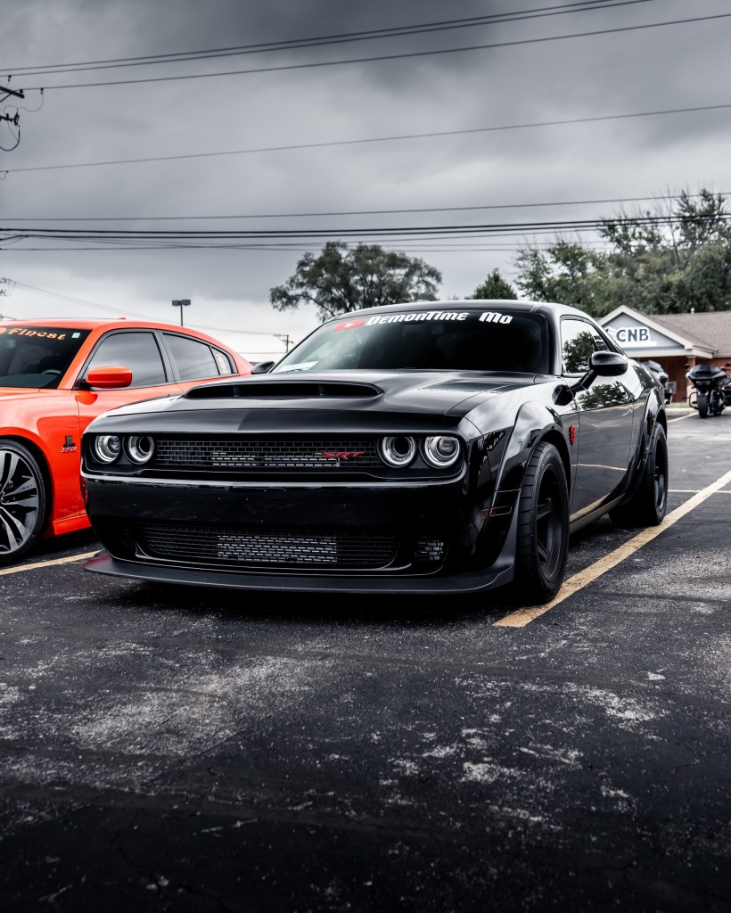 The Dodge SRT Demon, pictured here at a show, had mysterious options, like a $1 crate. 