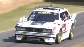 Family Huckster Travis Pastrana Subaru GL rally station wagon on track at Goodwood Festival of Speed top 10 2022