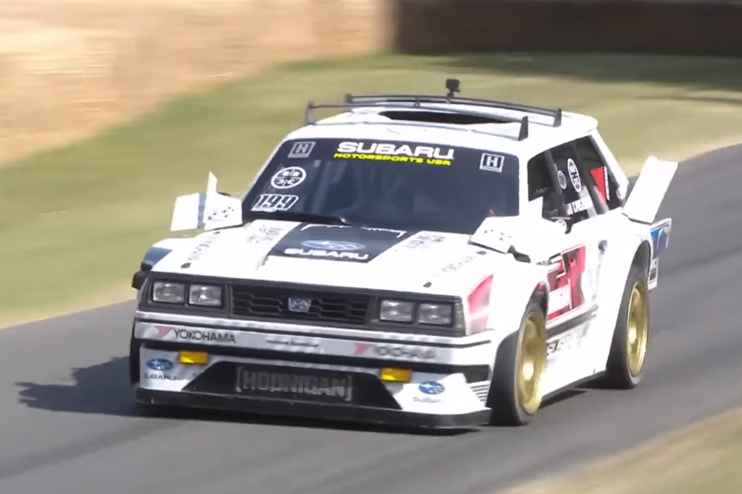 Family Huckster Travis Pastrana Subaru GL rally station wagon on track at Goodwood Festival of Speed top 10 2022