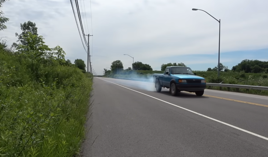 A Ford Ranger smokes it's tires after slamming into reverse at 50 mph