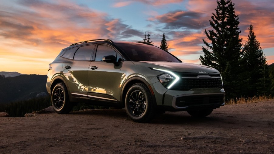 Front angle view of green 2023 Kia Sportage