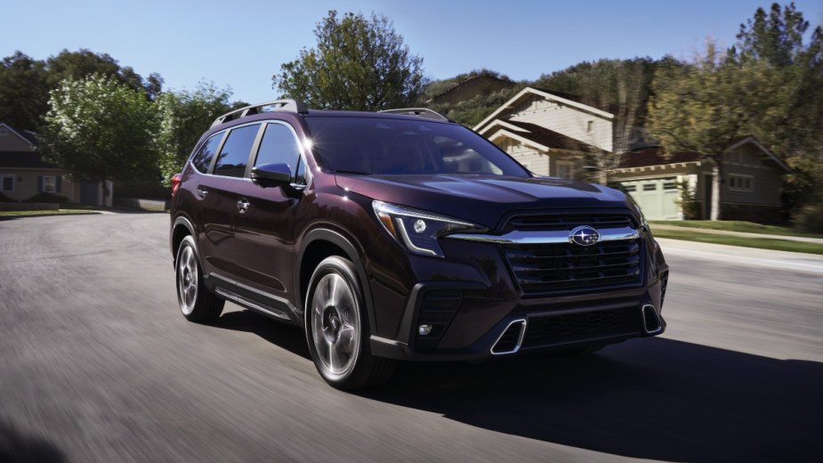 Front angle view of purple 2023 Subaru Ascent, highlighting its release date and price