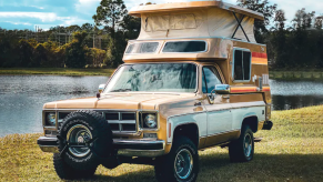 GMC Jimmy Casa Grande parked next to some water