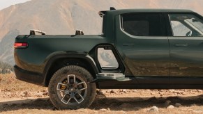 Gear tunnel cargo space in a green 2022 Rivian R1T EV pickup truck