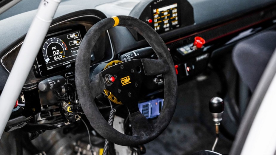 a track ready interior in the hpd honda civic si, stripped down to help you focus on your lap time