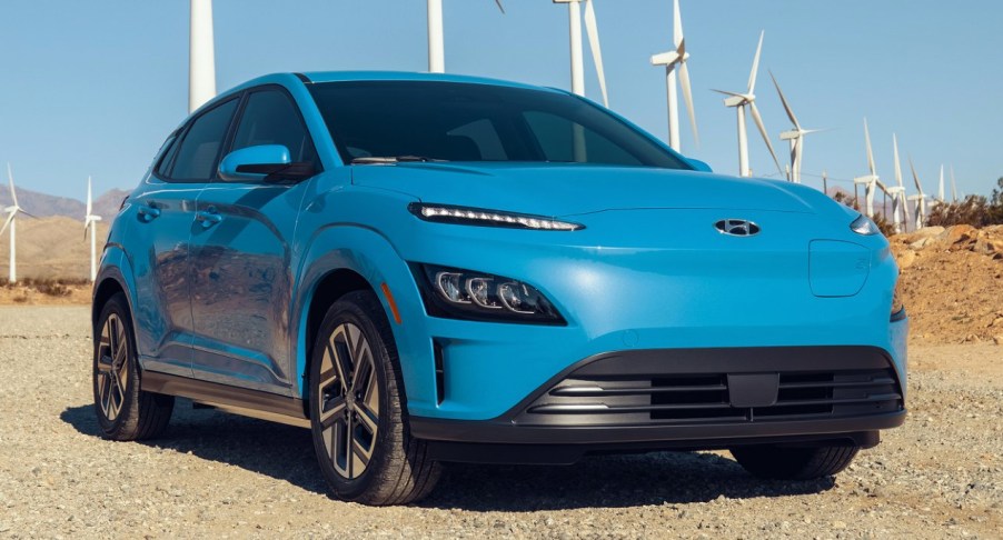 A blue 2022 Hyundai Kona Electric subcompact SUV is parked.