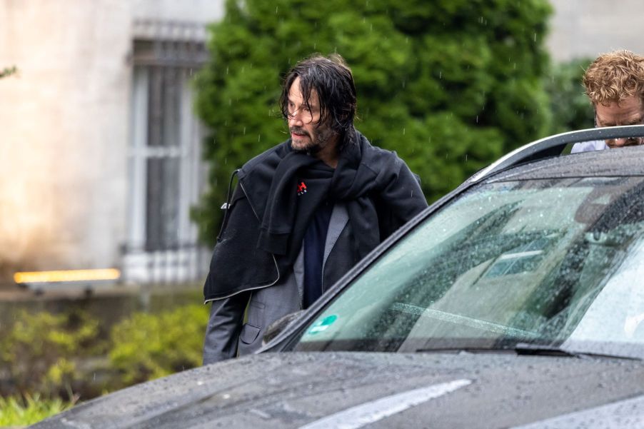 Keanu Reeves leaving his hotel by car to shoot 'John Wick: Chapter 4' in Berlin, Germany