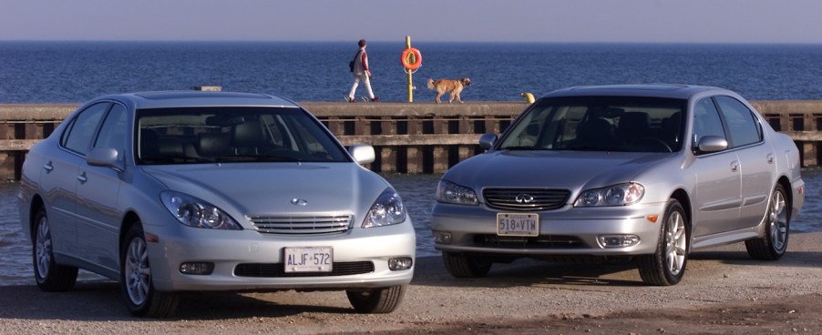 A Lexus ES 300 sitting next to an Infiniti i35