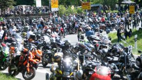 A group of motorcyclists on their motorcycles.