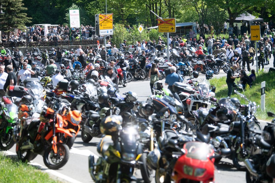 A group of motorcyclists on their motorcycles. 