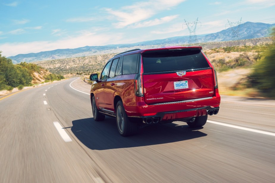 Rear angle view of red 2023 Cadillac Escalade V-Series, highlighting its release date and price