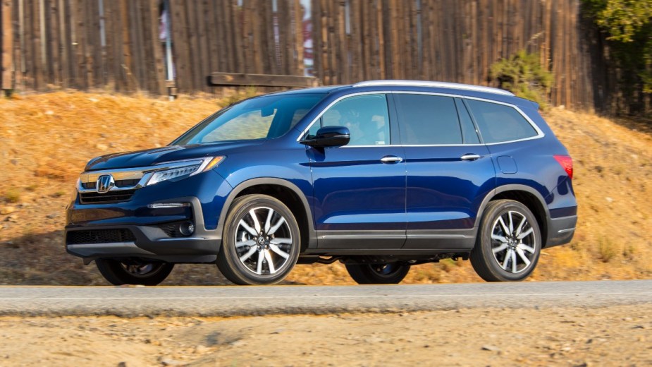 Side view of blue 2022 Honda Pilot