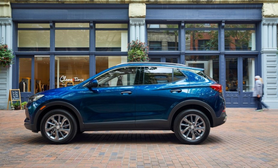 Side view of blue 2023 Buick Encore GX, highlighting its release date and price