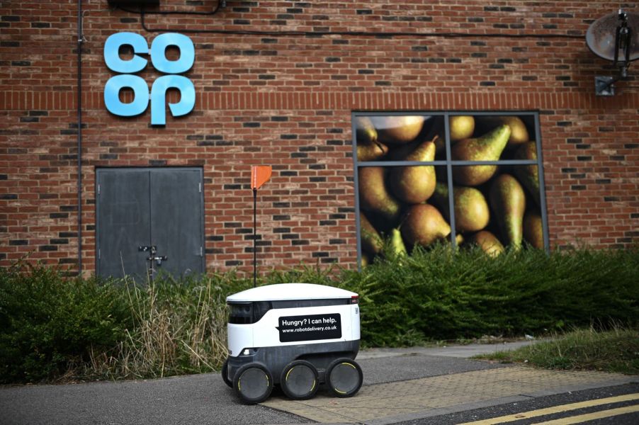 A Starship autonomous robot on its way to deliver groceries from a Co-Op supermarket in Milton Keynes, England