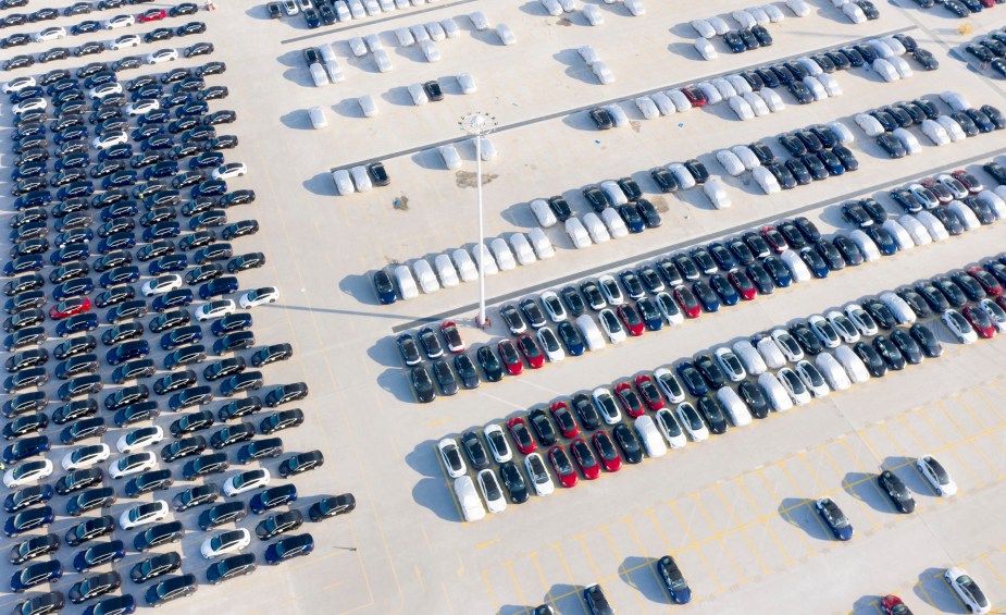 Tesla EVs are banned in some parts of China, like these cars at the Shanghai factory