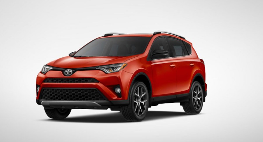 A red 2016 Toyota RAV4 crossover SUV.