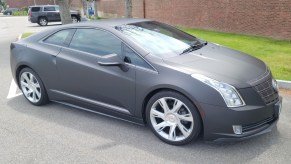 A black-wrapped 2014 Cadillac ELR in a parking lot