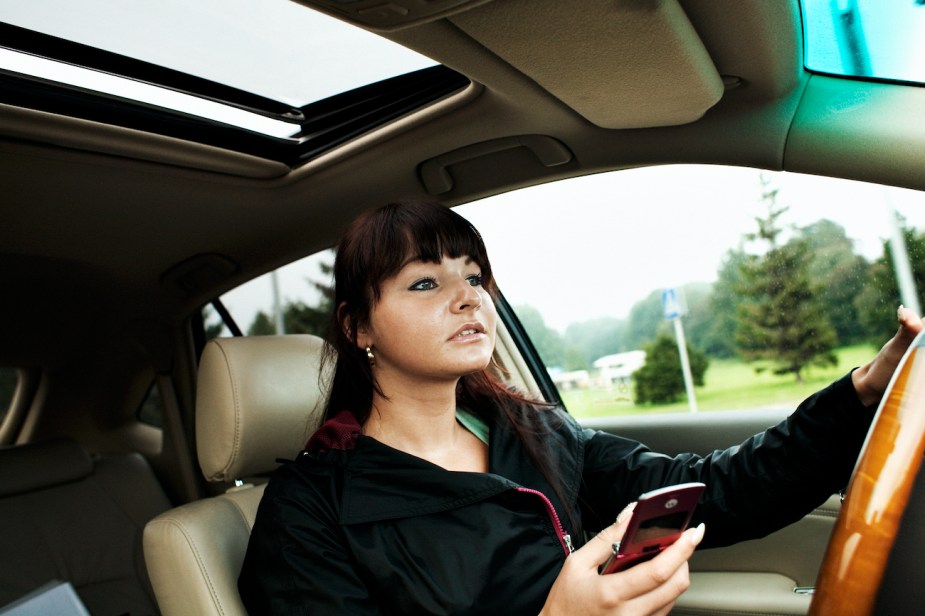 A woman uses her car for business purposes